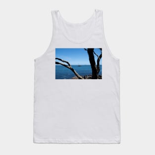 View through twisted pohutukawa tree branches across barge with crane blue ocean to distant horizon Tank Top